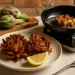 Carciofi alla giudia: la frittura perfetta secondo la tradizione delle osterie romane